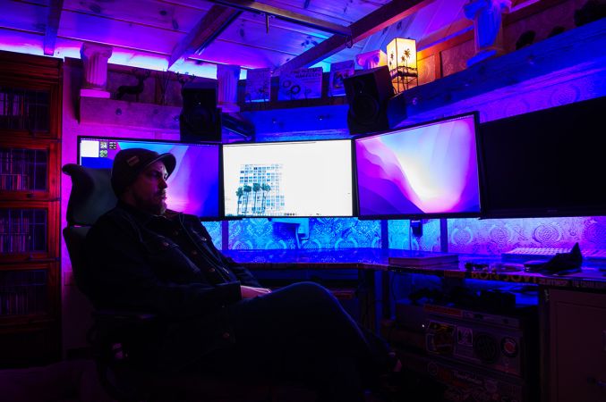 SW Hammond sitting at his computer in his office.