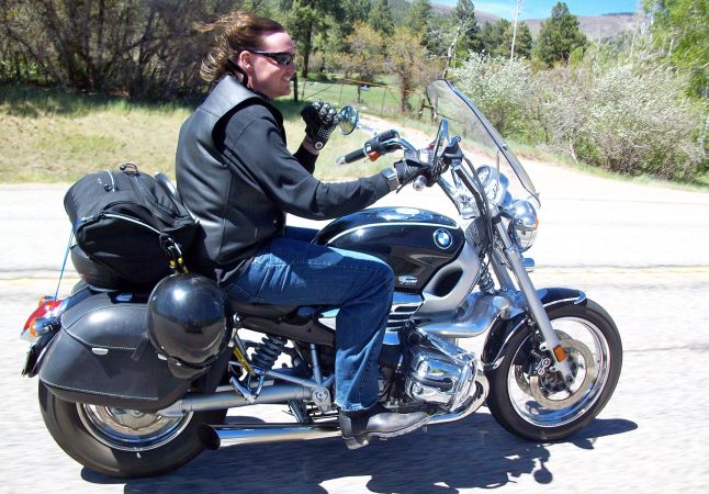 SW Hammond riding a BMW motorcycle.