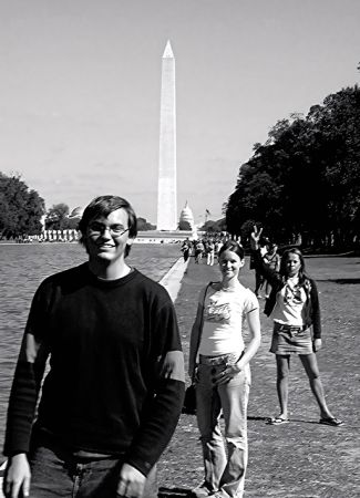 SW Hammond in front of the Washington Monument with two girl, Peace sign. Black and white.